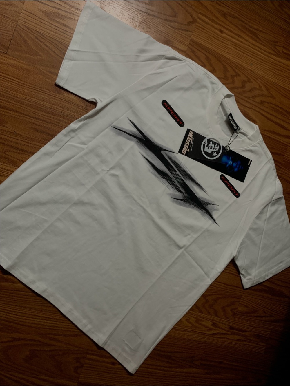 White Short-Sleeve Graphic Crewneck T-Shirt with Black Abstract Design